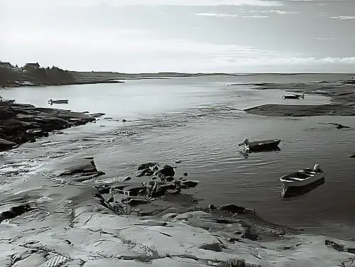 Grève et embarcations à Piaster Baie